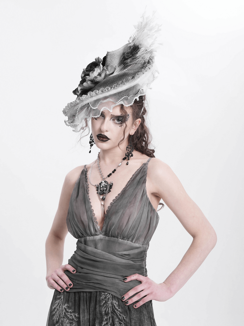 Elegant Black and White Floral Fascinator Hat with Feathers