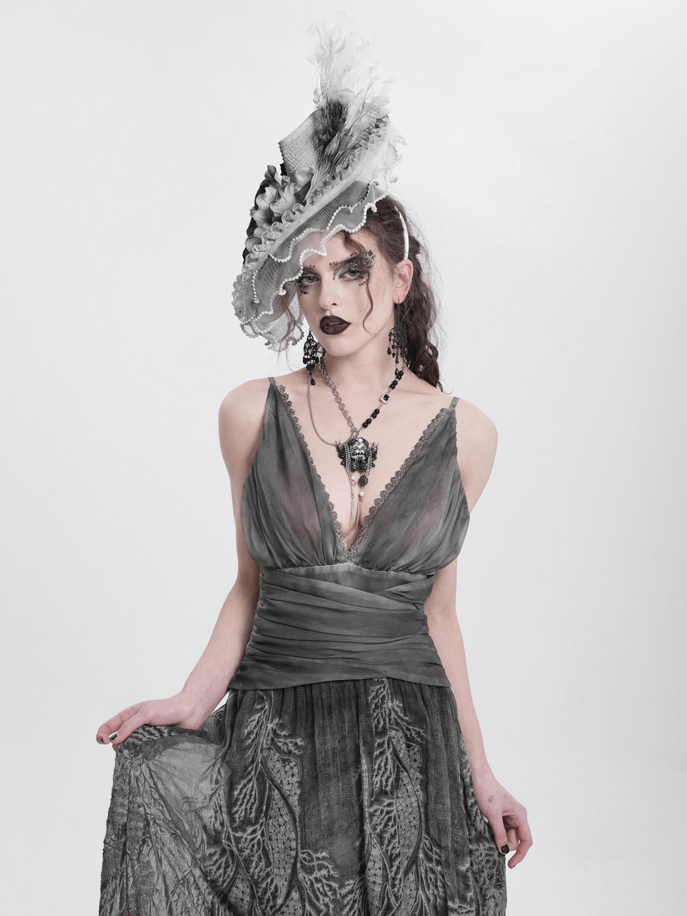 Elegant Black and White Floral Fascinator Hat with Feathers