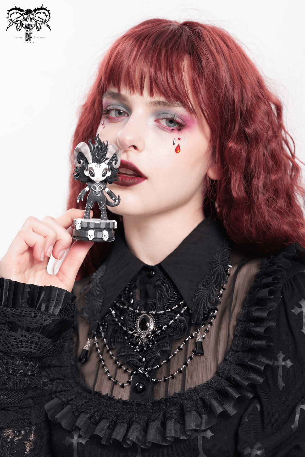 Gothic Demon Figure with Horns and Skull Base